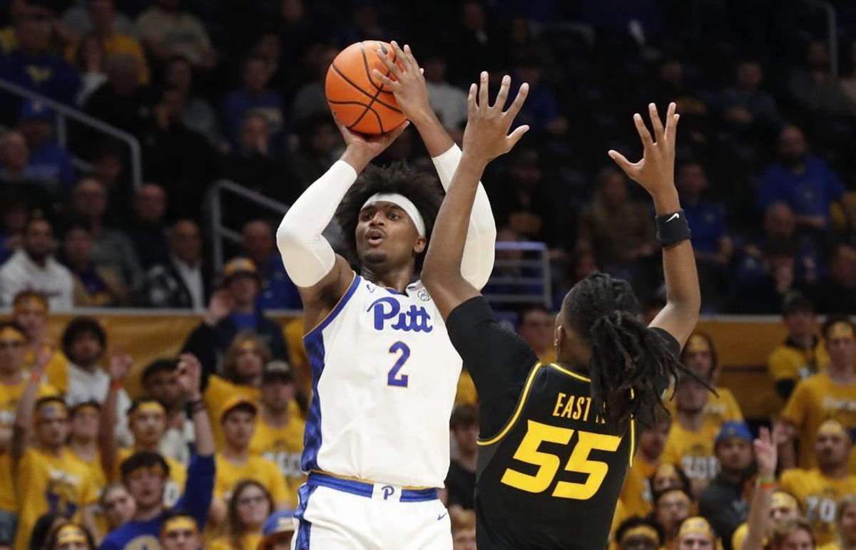 Nov 28, 2023; Pittsburgh, Pennsylvania, USA; Pittsburgh Panthers forward Blake Hinson (2) shoots a three point basket against Missouri Tigers guard Sean East II (55) during the second half at the Petersen Events Center. The Tigers won 71-64.