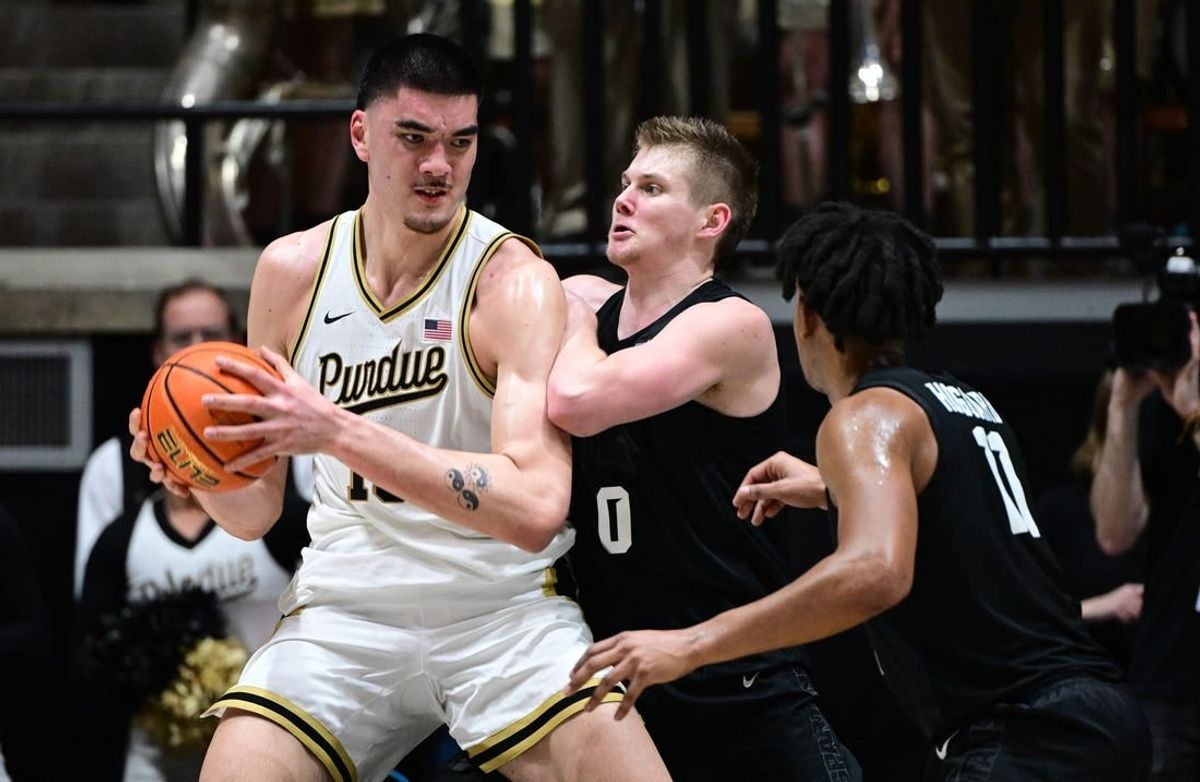 Mar 2, 2024; West Lafayette, Indiana, USA; Purdue Boilermakers center Zach Edey (15) pushes against Michigan State Spartans forward Jaxon Kohler (0) during the first half at Mackey Arena.