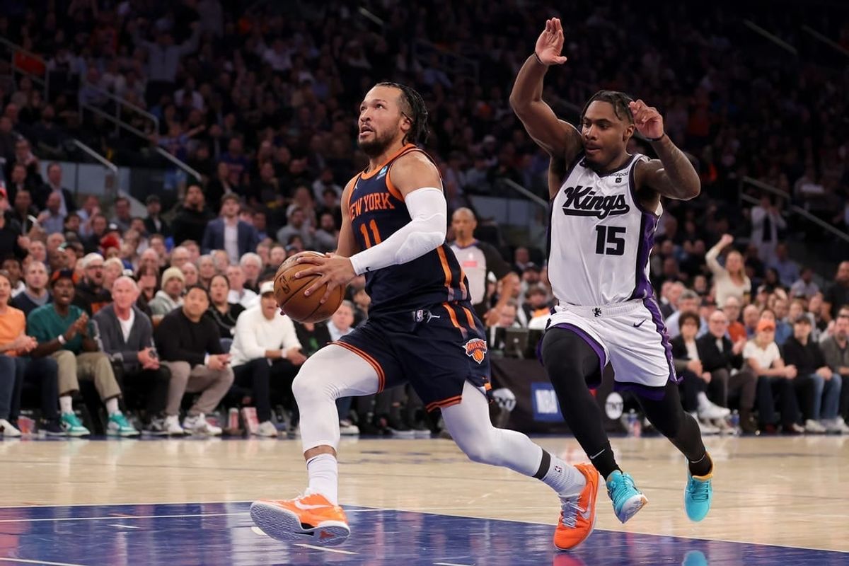 Apr 4, 2024; New York, New York, USA; New York Knicks guard Jalen Brunson (11) drives to the basket against Sacramento Kings guard Davion Mitchell (15) during the second quarter at Madison Square Garden.