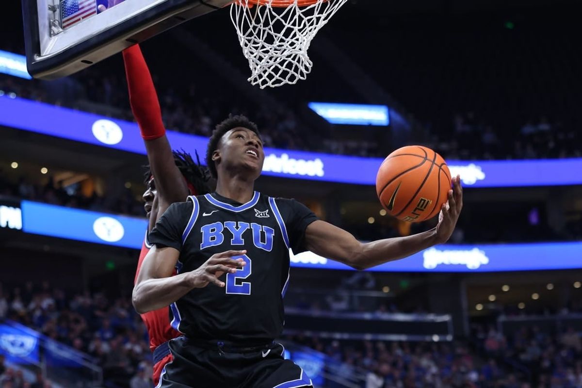 Dec 1, 2023; Salt Lake City, Utah, USA; Brigham Young Cougars guard Jaxson Robinson (2) lays the ball up against the Fresno State Bulldogs during the first half at Delta Center.