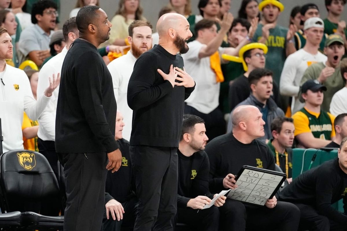 Feb 3, 2024; Waco, Texas, USA; Baylor Bears associate head coach John Jakus reacts after receiving a technical foul against the Iowa State Cyclones during the second half at Paul and Alejandra Foster Pavilion.