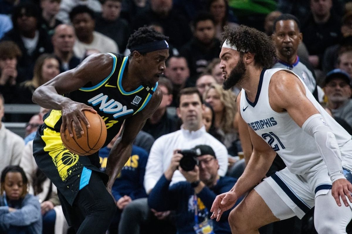 Jan 28, 2024; Indianapolis, Indiana, USA; Indiana Pacers forward Pascal Siakam (43) dribbles the ball while Memphis Grizzlies forward David Roddy (21) defends in the first half at Gainbridge Fieldhouse.
