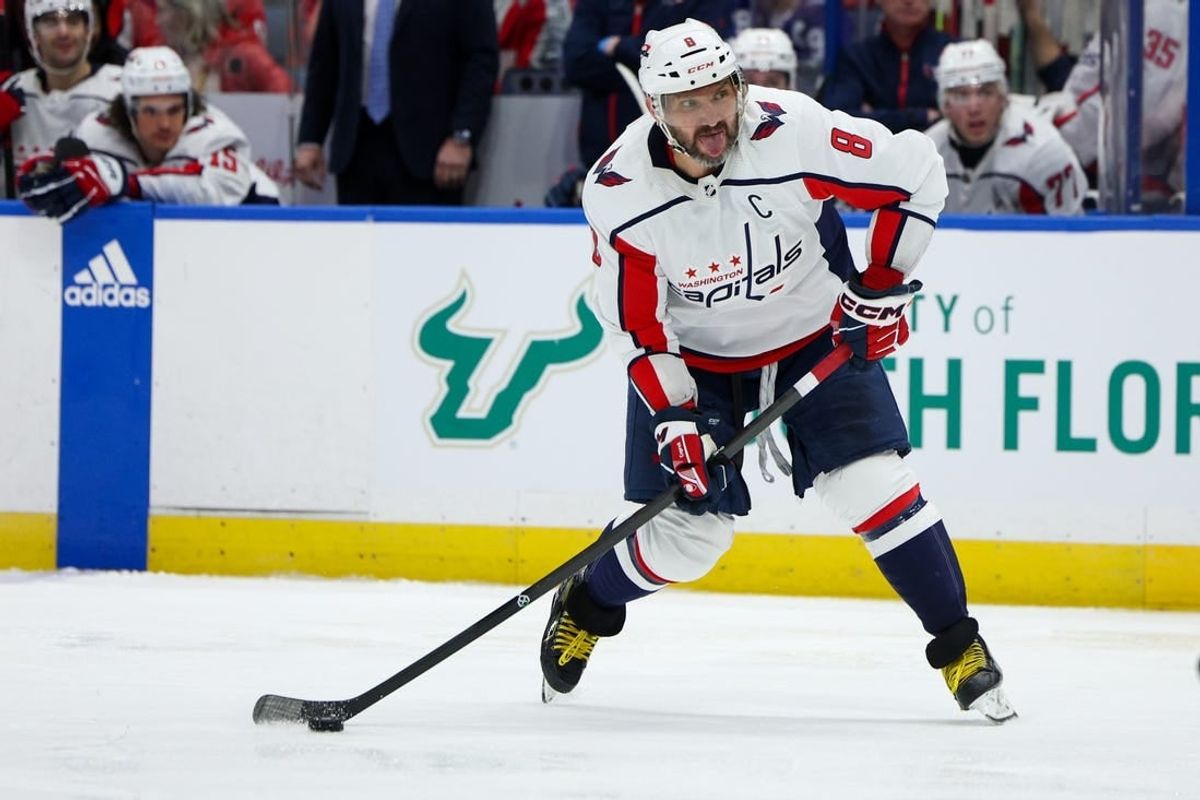 Feb 22, 2024; Tampa, Florida, USA;  Washington Capitals left wing Alex Ovechkin (8) shoots the puck against the Tampa Bay Lightning in the second period at Amalie Arena.