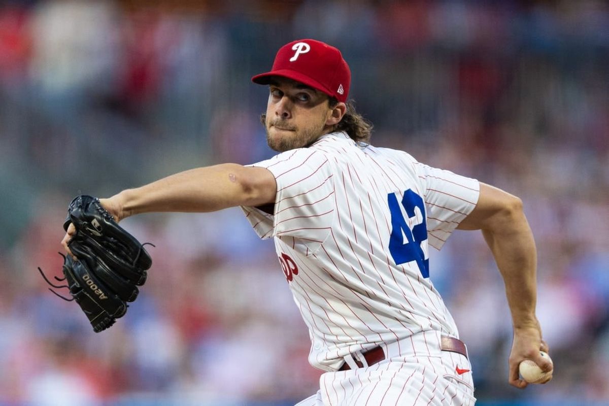 Apr 15, 2024; Philadelphia, Pennsylvania, USA; Philadelphia Phillies pitcher Aaron Nola (42) throws a pitch during the third inning against the Colorado Rockies at Citizens Bank Park.