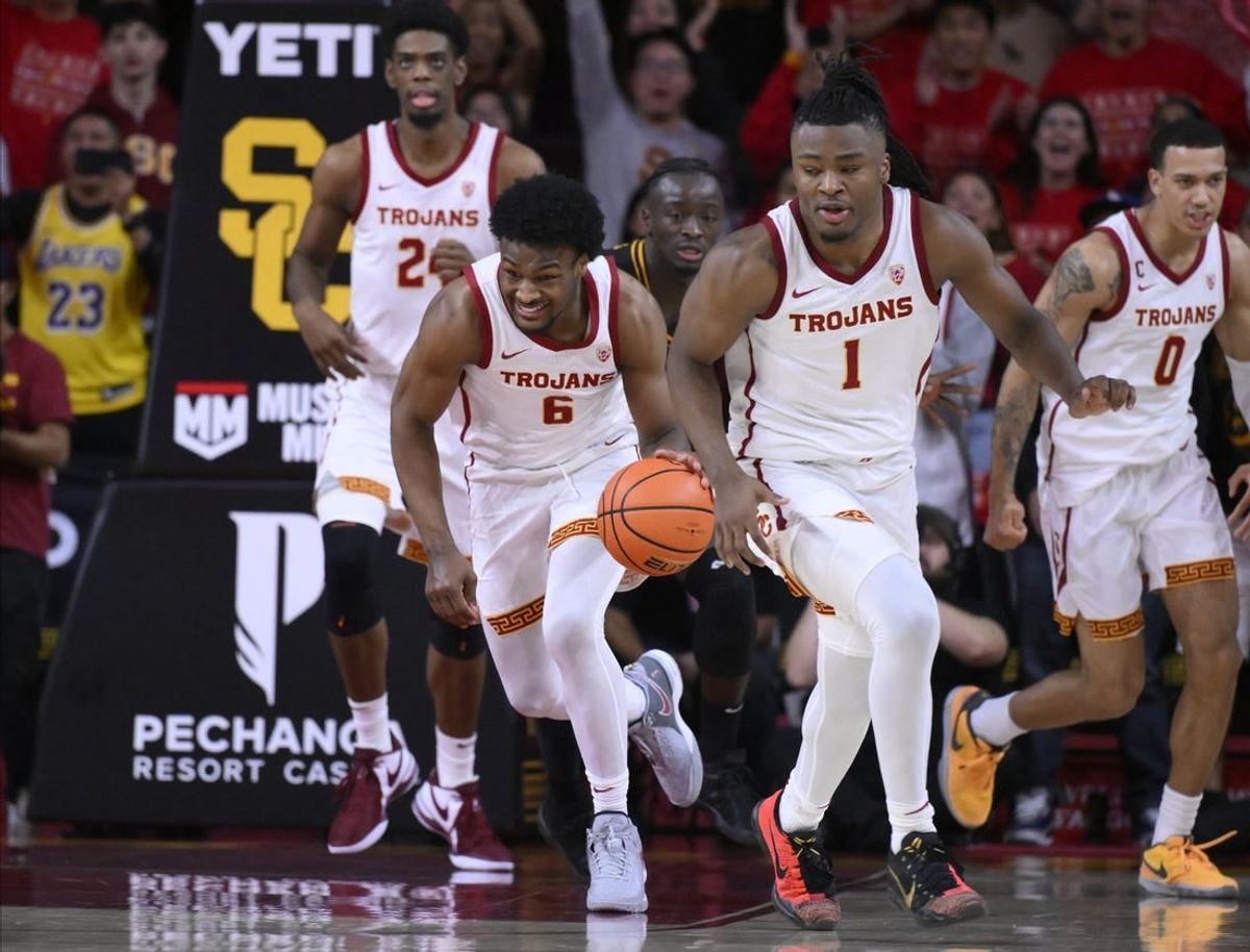 Dec 10, 2023; Los Angeles, California, USA; USC Trojans guard Bronny James (6) pushes the ball up court during the 2nd half against the Long Beach State 49ers at Galen Center. USC Trojans forward Joshua Morgan (24), guard Isaiah Collier (1) and USC Trojans guard Kobe Johnson (0) are also in the play.