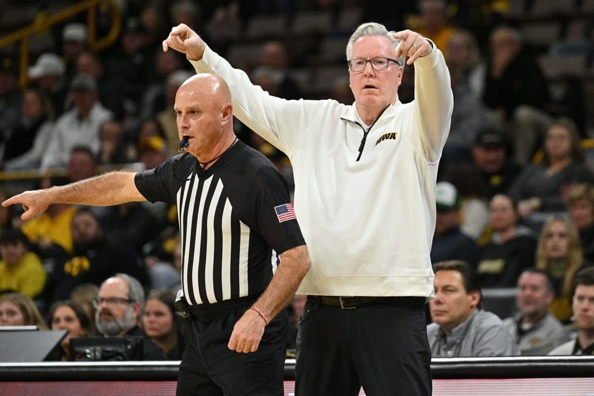 Nov 29, 2023; Iowa City, Iowa, USA; Iowa Hawkeyes head coach Fran McCaffery reacts with an official during the first half against the North Florida Ospreys at Carver-Hawkeye Arena.