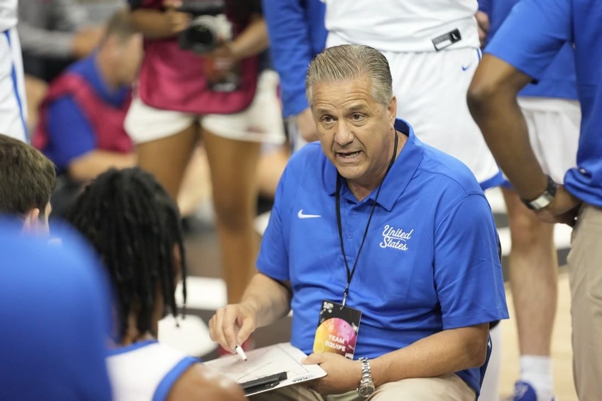 Jul 16, 2023; Toronto, Ontario, Canada; USA-Kentucky head coach John Calipari talks to his players during the first half of the Men's Gold game against Canada at Mattamy Athletic Centre.