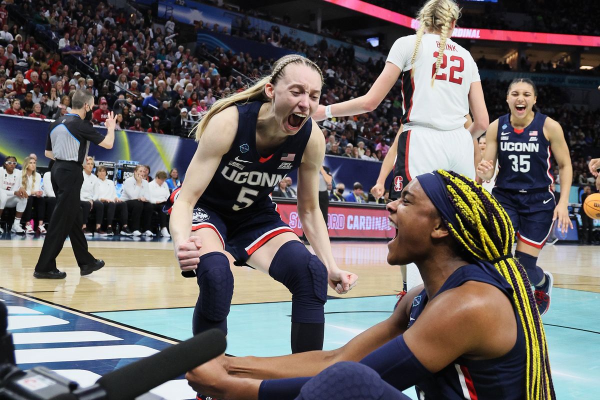 Paige Bueckers and Aaliyah Edwards celebrate during the fourth quarter of Friday’s win over Stanford.