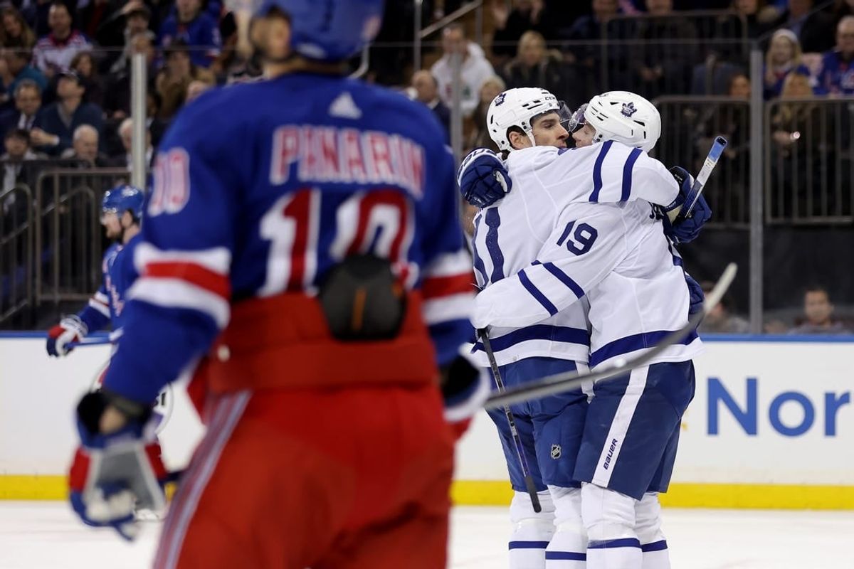 Dec 12, 2023; New York, New York, USA; Toronto Maple Leafs center Calle Jarnkrok (19) celebrates his goal against the New York Rangers with center John Tavares (91) during the first period at Madison Square Garden.