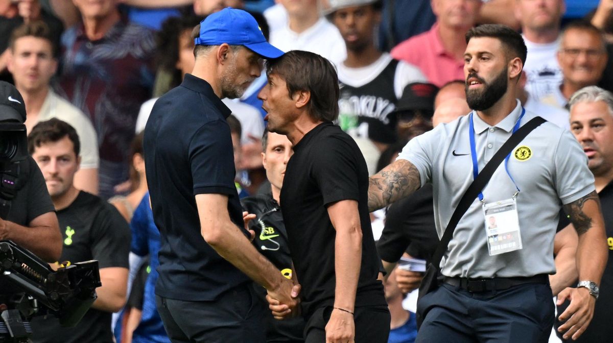 Tottenham’s head coach Antonio Conte (R) and Chelsea’s head coach Thomas Tuchel (L) shake hands and  then clash after the English Premier League football match between Chelsea and Tottenham Hotspur at Stamford Bridge in London.
