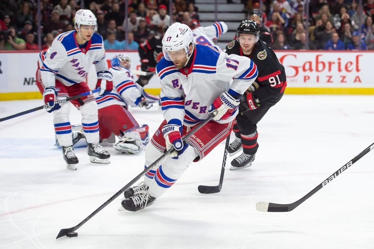 Jan 27, 2024; Ottawa, Ontario, CAN; New York Rangers right wing Blake Wheeler (17) skates with the puck in the first period against the Ottawa Senators at the Canadian Tire Centre.