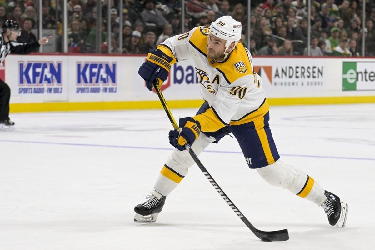 Mar 10, 2024; Saint Paul, Minnesota, USA;  Nashville Predators forward Ryan O'Reilly (90) scores a power play goal against the Minnesota Wild during the third period at Xcel Energy Center.