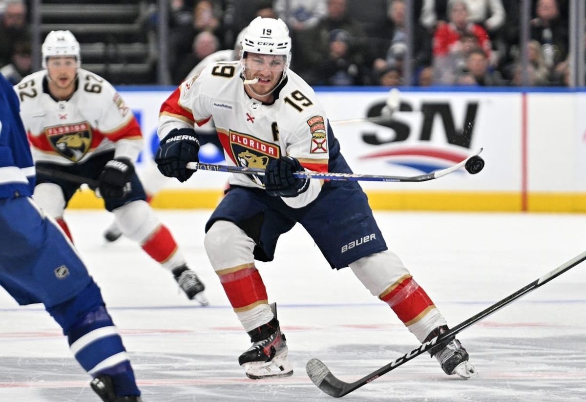 Apr 1, 2024; Toronto, Ontario, CAN; Florida Panthers forward Matthew Tkachuk (19) flips the puck into the Toronto Maple Leafs zone in the third period at Scotiabank Arena.