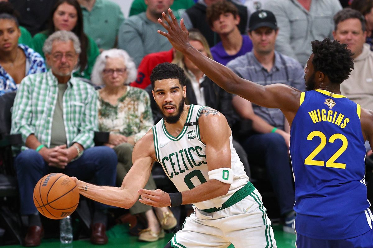 Andrew Wiggins helped keep Jayson Tatum at bay.