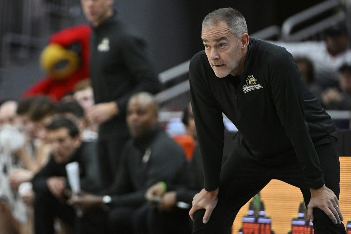 Nov 12, 2022; Louisville, Kentucky, USA;  Wright State Raiders head coach Scott Nagy watches from the sideline during the second half against the Louisville Cardinals at KFC Yum! Center. Wright State defeated Louisville 73-72.