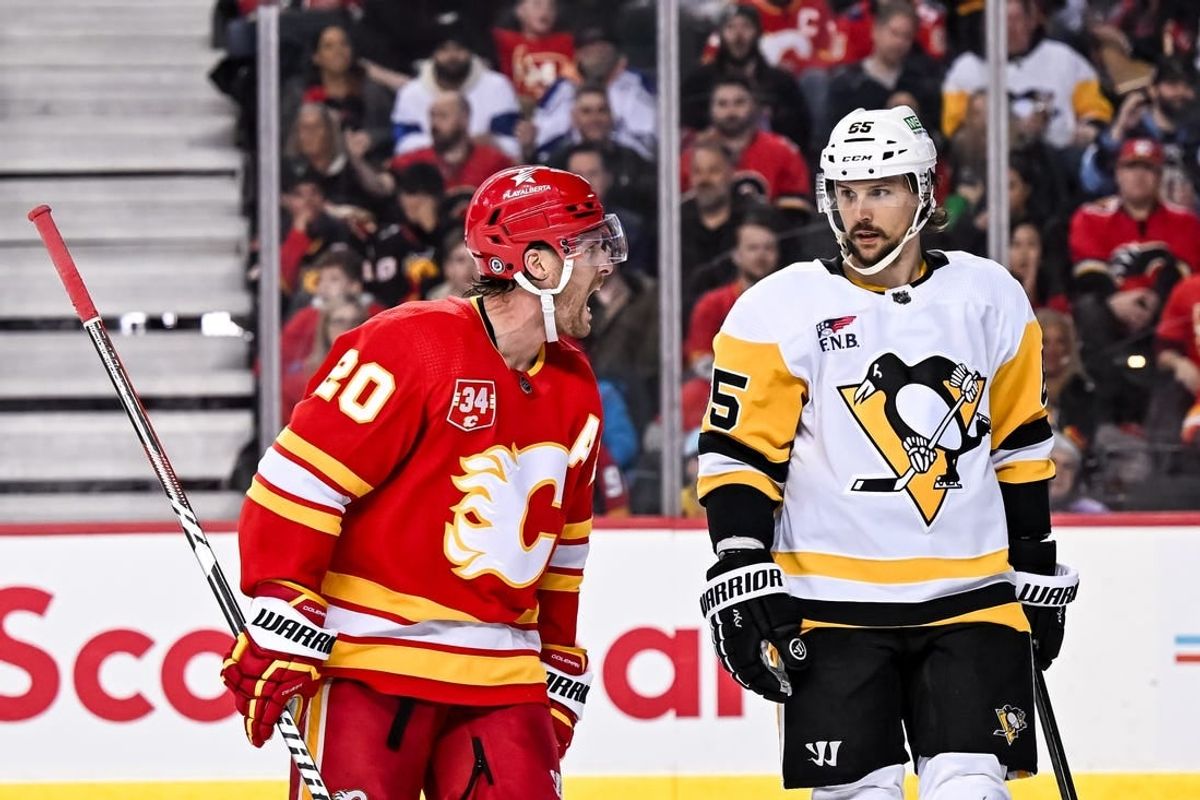Mar 2, 2024; Calgary, Alberta, CAN; Calgary Flames center Blake Coleman (20) opposes a penalty call while Pittsburgh Penguins defenseman Erik Karlsson (65) looks on during the third period at Scotiabank Saddledome.