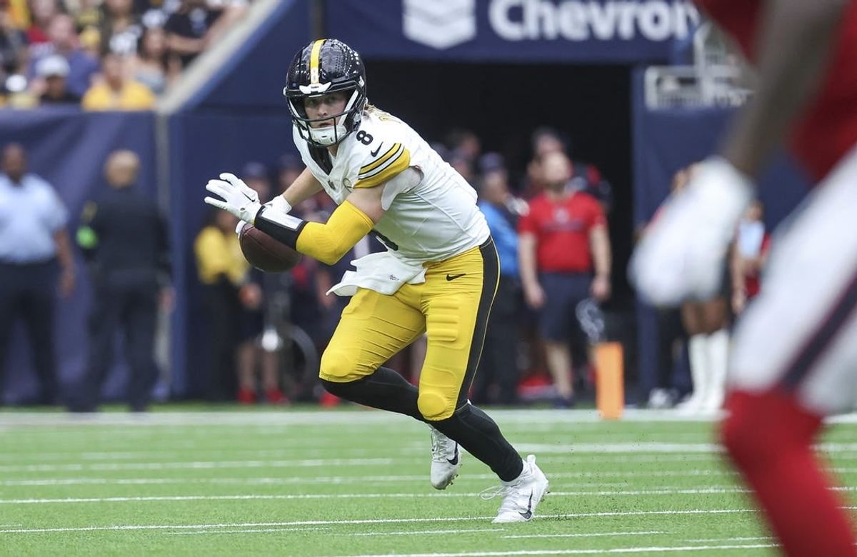 Oct 1, 2023; Houston, Texas, USA; Pittsburgh Steelers quarterback Kenny Pickett (8) rolls out of the pocket during the game against the Houston Texans at NRG Stadium.