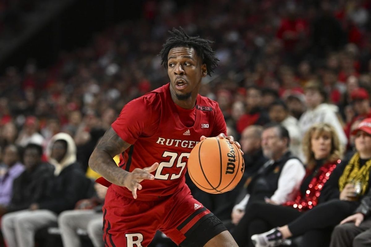 Feb 6, 2024; College Park, Maryland, USA; Rutgers Scarlet Knights guard Jeremiah Williams (25) makes a move to the basket during the first half  against the Maryland Terrapins at Xfinity Center.