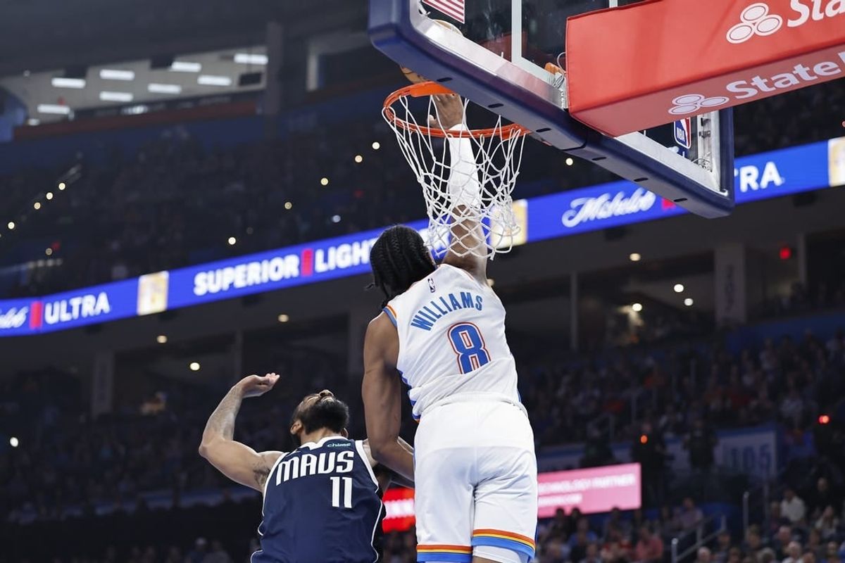 Mar 14, 2024; Oklahoma City, Oklahoma, USA; Oklahoma City Thunder forward Jalen Williams (8) blocks a shot by Dallas Mavericks guard Kyrie Irving (11) during the first half at Paycom Center.
