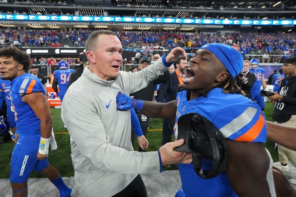 Dec 2, 2023; Las Vegas, NV, USA; Boise State Broncos head coach Spencer Danielson celebrates with running back Ashton Jeanty (2) after 44-20 victory over the UNLV Rebels in the Mountain West Championship at Allegiant Stadium.