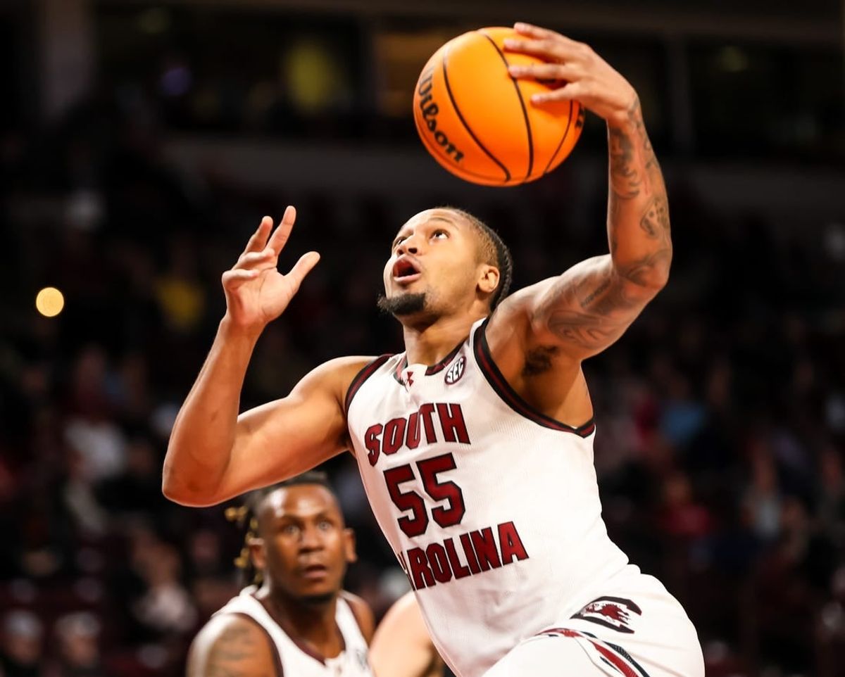Dec 19, 2023; Columbia, South Carolina, USA; South Carolina Gamecocks guard Ta'Lon Cooper (55) drives against the Winthrop Eagles in the first half at Colonial Life Arena.