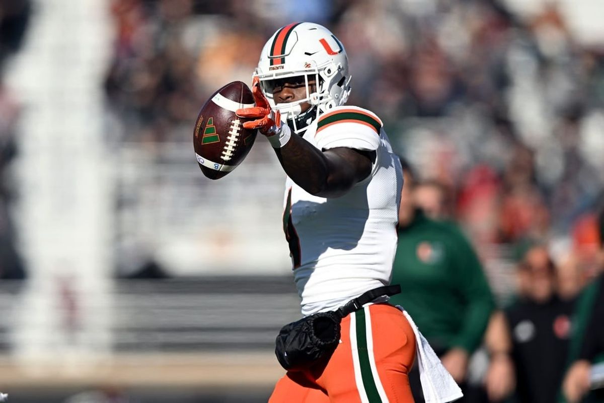 Nov 24, 2023; Chestnut Hill, Massachusetts, USA; Miami Hurricanes wide receiver Colbie Young (4) reacts after making a reception against the Boston College Eagles during the first half at Alumni Stadium.