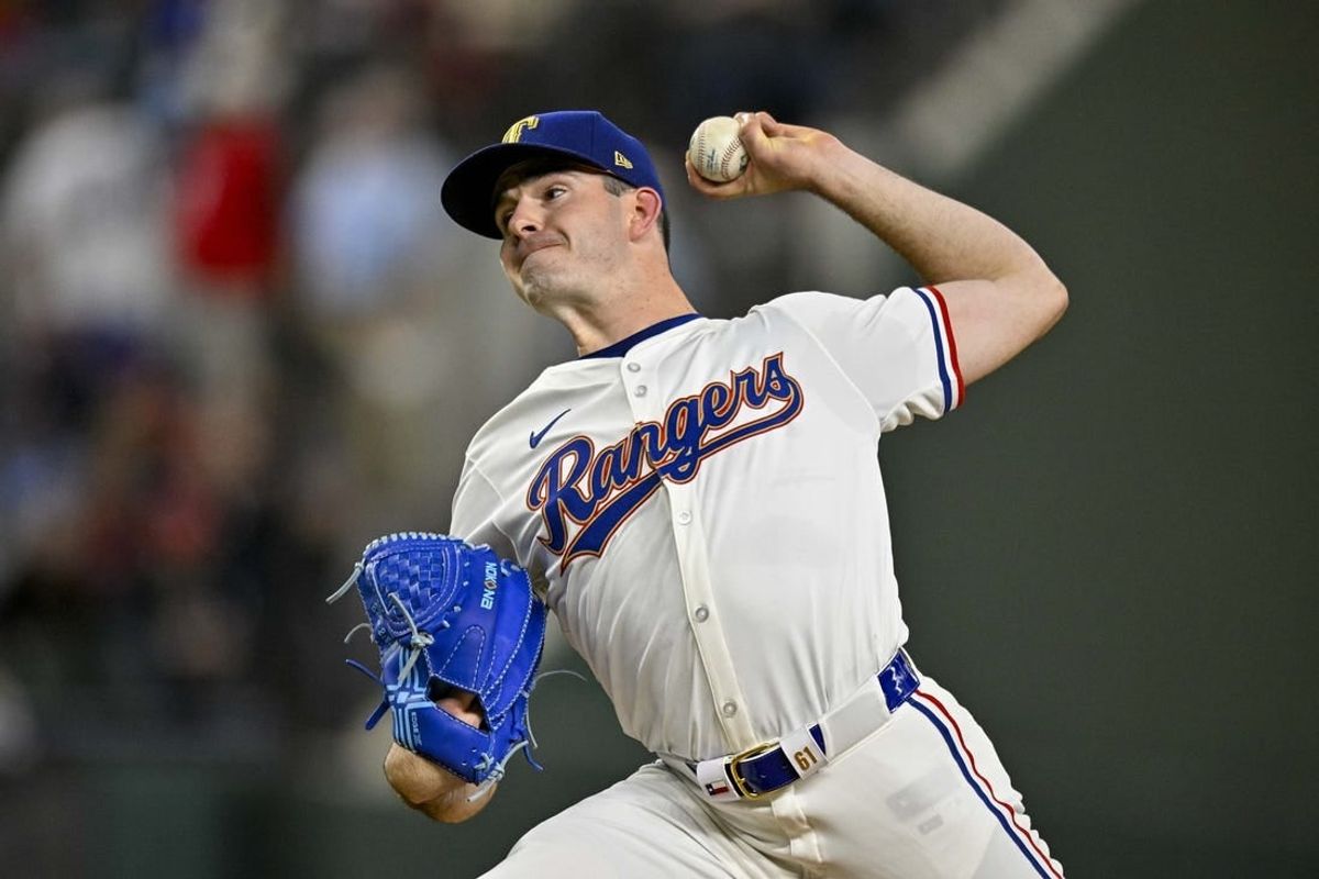 Apr 10, 2024; Arlington, Texas, USA; Texas Rangers starting pitcher Cody Bradford (61) pitches against the Oakland Athletics during the seventh inning at Globe Life Field.