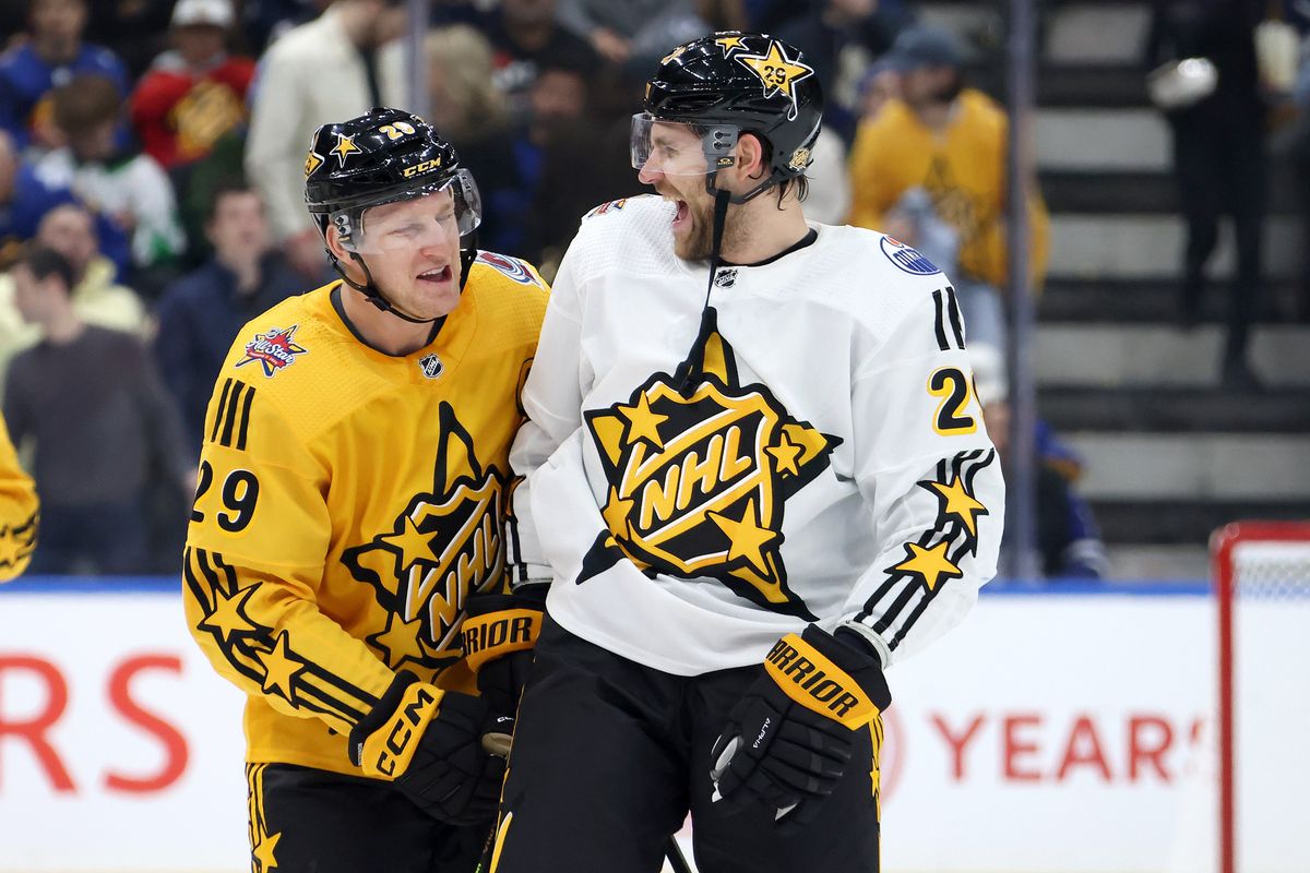 TORONTO, ONTARIO - FEBRUARY 03:  Nathan MacKinnon #29 of the Colorado Avalanche and Leon Draisaitl #29 of the Edmonton Oilers meet after the game between Team Mackinnon and Team McDavid during the 2024 Honda NHL All-Star Game on February 03, 2024 in Toronto, Ontario. (Photo by Bruce Bennett/Getty Images)