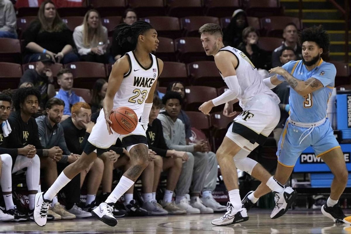 Nov 17, 2023; Charleston, SC, USA; Wake Forest Demon Deacons guard Hunter Sallis (23) drives with the ball in the second half against the Towson Tigers at TD Arena.