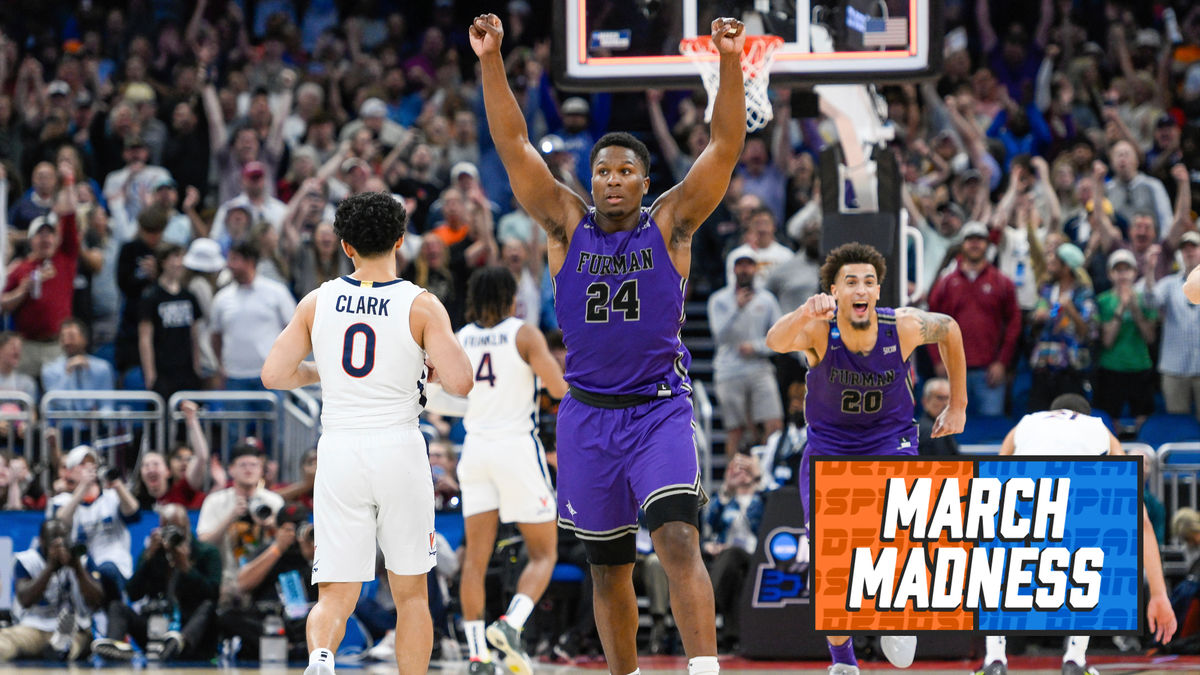 Furman Paladins forward Alex Williams reacts after Furman defeats Virginia, 68-67, in the opening round of the NCAA Tournament.
