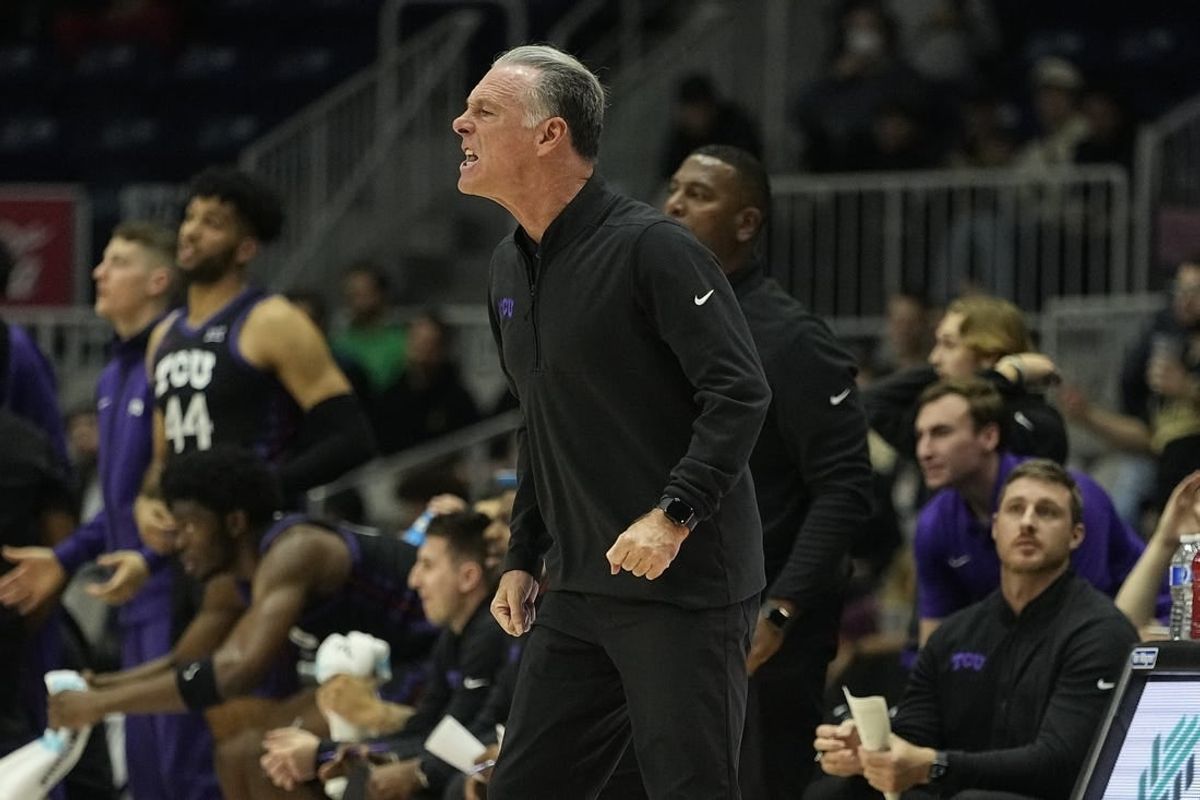 Dec 9, 2023; Toronto, Ontario, CAN; TCU Horned Frogs head coach Jamie Dixon reacts during the first half against the Clemson Tigers at Coca-Cola Coliseum.