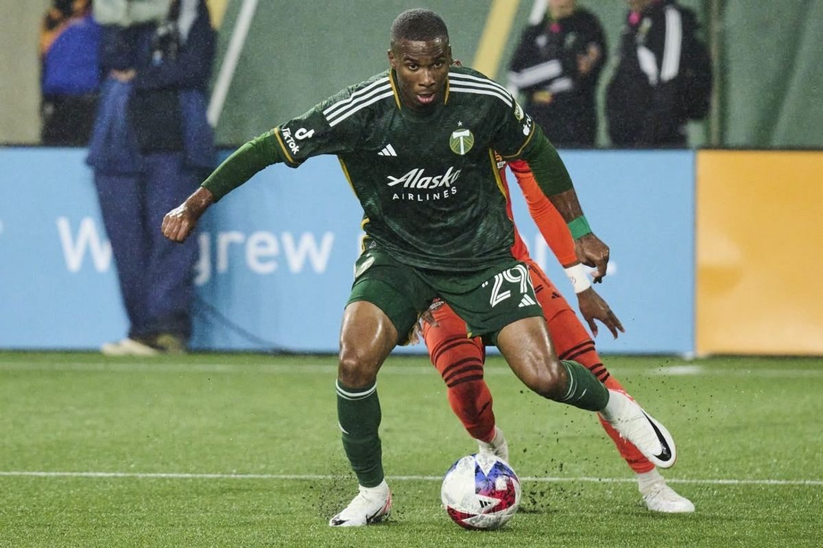 Oct 21, 2023; Portland, Oregon, USA; Portland Timbers defender Juan David Mosquera (29) steals the ball away from Houston Dynamo forward Nelson Quinones (21) during the second half at Providence Park.