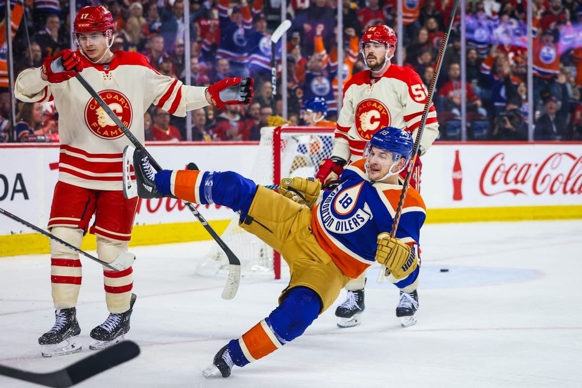 Jan 20, 2024; Calgary, Alberta, CAN; Edmonton Oilers left wing Zach Hyman (18) scores a goal against Calgary Flames during the third period at Scotiabank Saddledome.