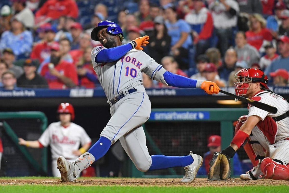 Sep 24, 2023; Philadelphia, Pennsylvania, USA; New York Mets shortstop Ronny Mauricio (10) hits a two run home run during the sixth inning against the Philadelphia Phillies at Citizens Bank Park.
