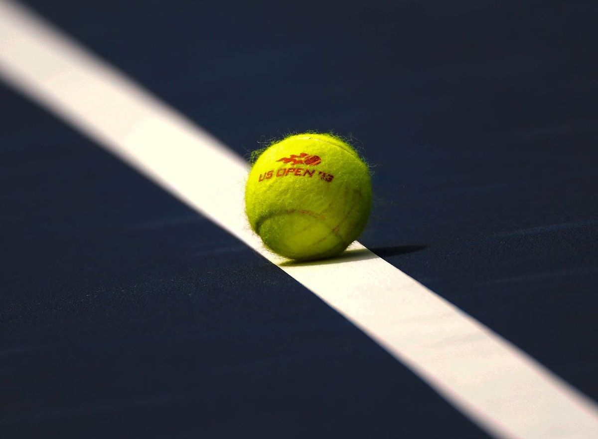 Aug 29, 2013; New York, NY, USA; A general view of a tennis ball on a line before the match between Serena Williams (USA) and Galina Voskoboeva (KAZ) on day four of the 2013 US Open at the Billie Jean King National Tennis Center. Mandatory Credit: Robert Deutsch-Imagn Images