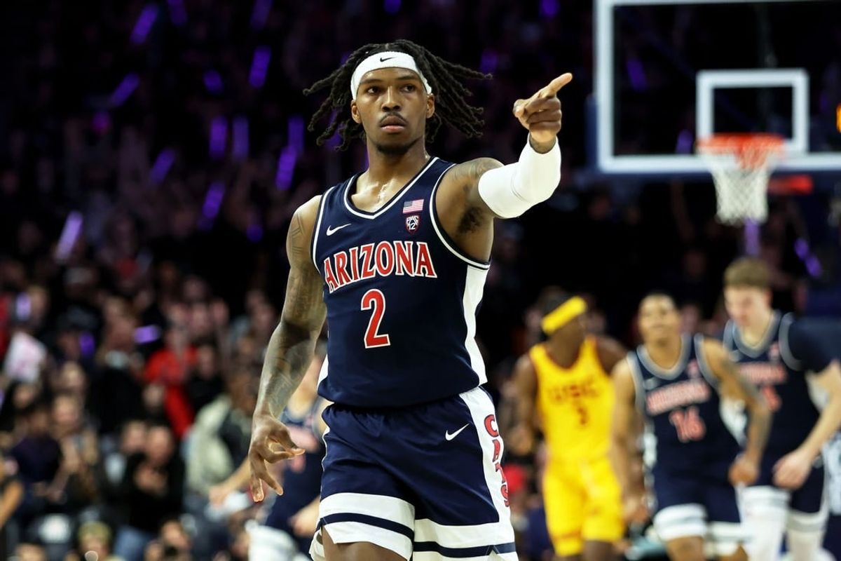Arizona Wildcats guard Caleb Love (2) celebrates a 3-point basket against the USC Trojans at McKale Center.