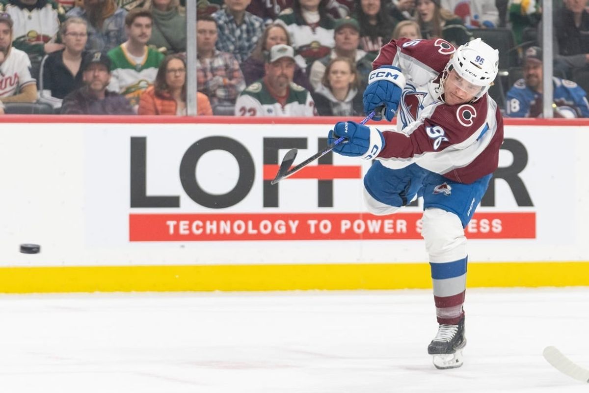 Apr 4, 2024; Saint Paul, Minnesota, USA; Colorado Avalanche right wing Mikko Rantanen (96) shoots on the Minnesota Wild in the first period at Xcel Energy Center.