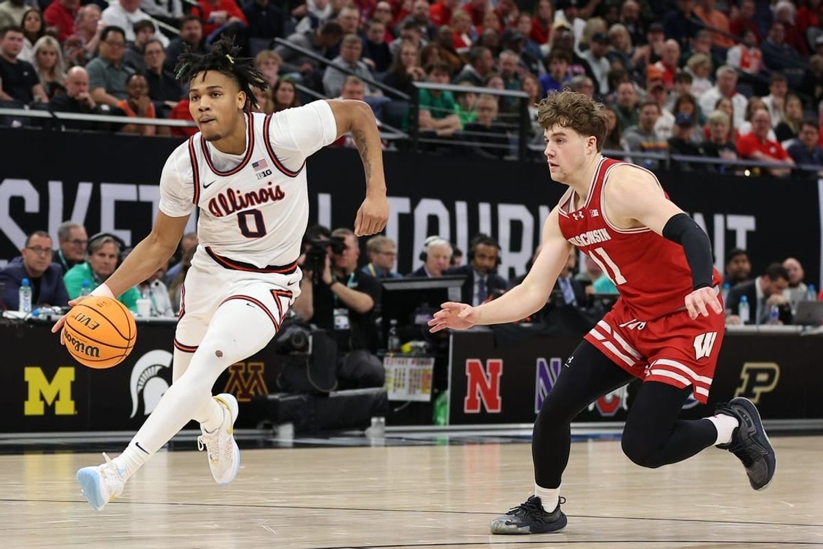 Mar 17, 2024; Minneapolis, MN, USA; Illinois Fighting Illini guard Terrence Shannon Jr. (0) plays the ball in the second half against the Wisconsin Badgers at Target Center.