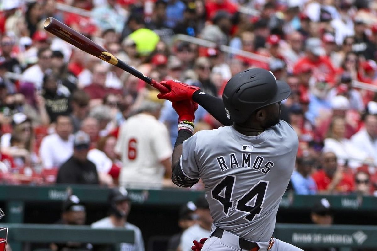 May 5, 2024; St. Louis, Missouri, USA;  Chicago White Sox third baseman Bryan Ramos (44) hits a one run sacrifice fly against the St. Louis Cardinals during the second inning at Busch Stadium.
