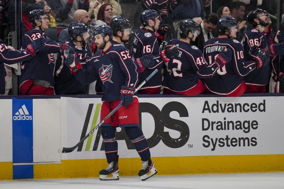 cJan 13, 2024; Columbus, Ohio, USA;  Columbus Blue Jackets right wing Emil Bemstrom (52) celebrates with teammates on the bench after scoring a goal against the Seattle Kraken in the third period at Nationwide Arena.