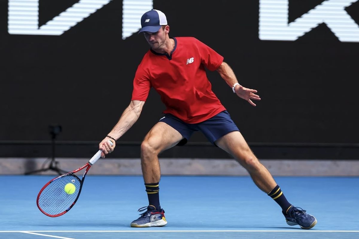 Jan 20, 2024; Melbourne, Victoria, Australia; Tommy Paul of the United States plays a shot against Miomir Kecmanovic (not pictured) of Serbia in Round 3 of the Men's Singles on Day 7 of the Australian Open tennis at Margaret Court Arena.