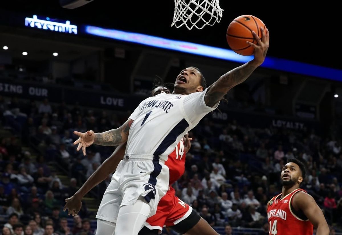 Mar 10, 2024; University Park, Pennsylvania, USA; Penn State Nittany Lions guard Ace Baldwin Jr (1) drives the ball to the basket during the first half against the Maryland Terrapins at Bryce Jordan Center.