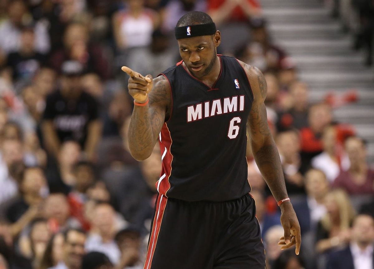 Nov 5, 2013; Toronto, Ontario, CAN; Miami Heat forward LeBron James (6) reacts after making a basket against the Toronto Raptors at Air Canada Centre. The Heat beat the Raptors 104-95. Mandatory Credit: Tom Szczerbowski-Imagn Images