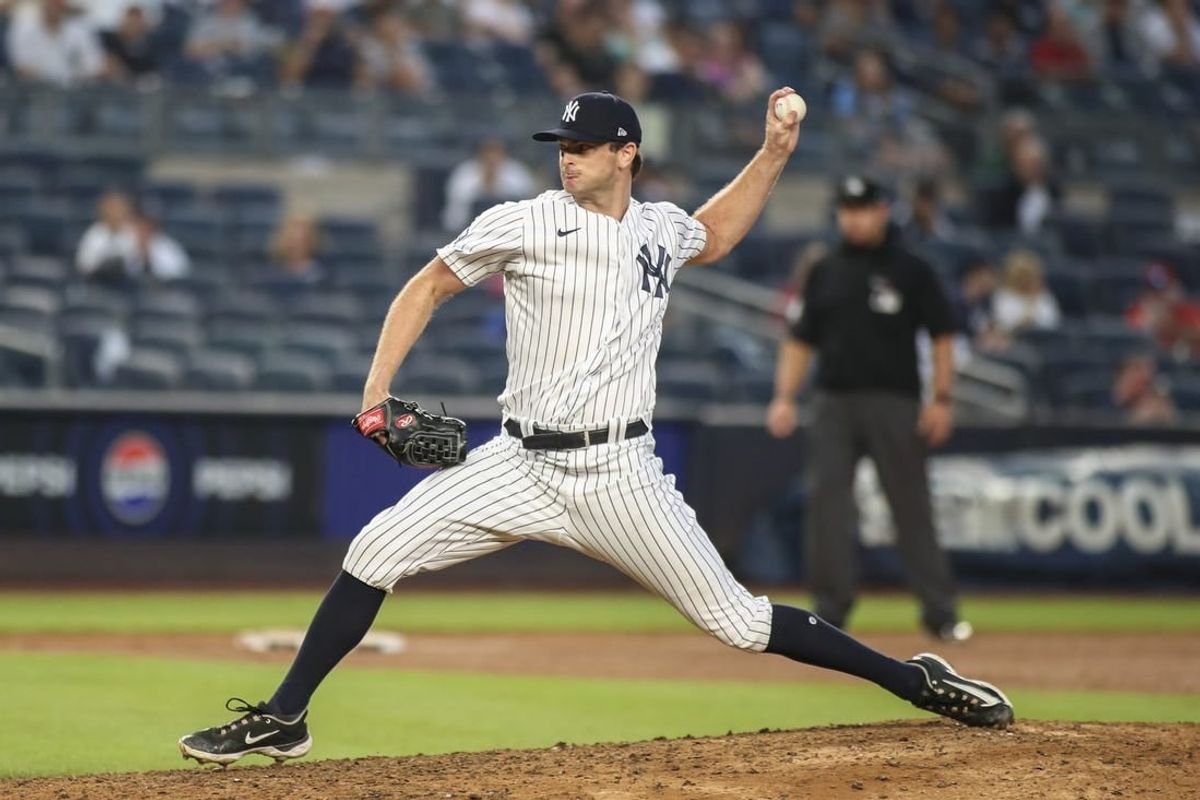 Sep 9, 2023; Bronx, New York, USA;  New York Yankees relief pitcher Matt Krook (92) pitches in the ninth inning against the Milwaukee Brewers at Yankee Stadium.
