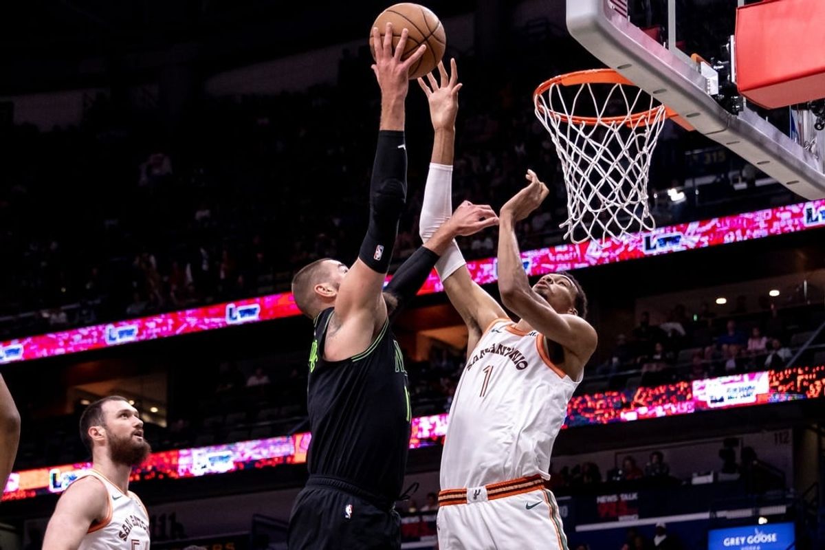 Apr 5, 2024; New Orleans, Louisiana, USA; New Orleans Pelicans center Jonas Valanciunas (17) drives to the basket against San Antonio Spurs center Victor Wembanyama (1) during the first half at Smoothie King Center.