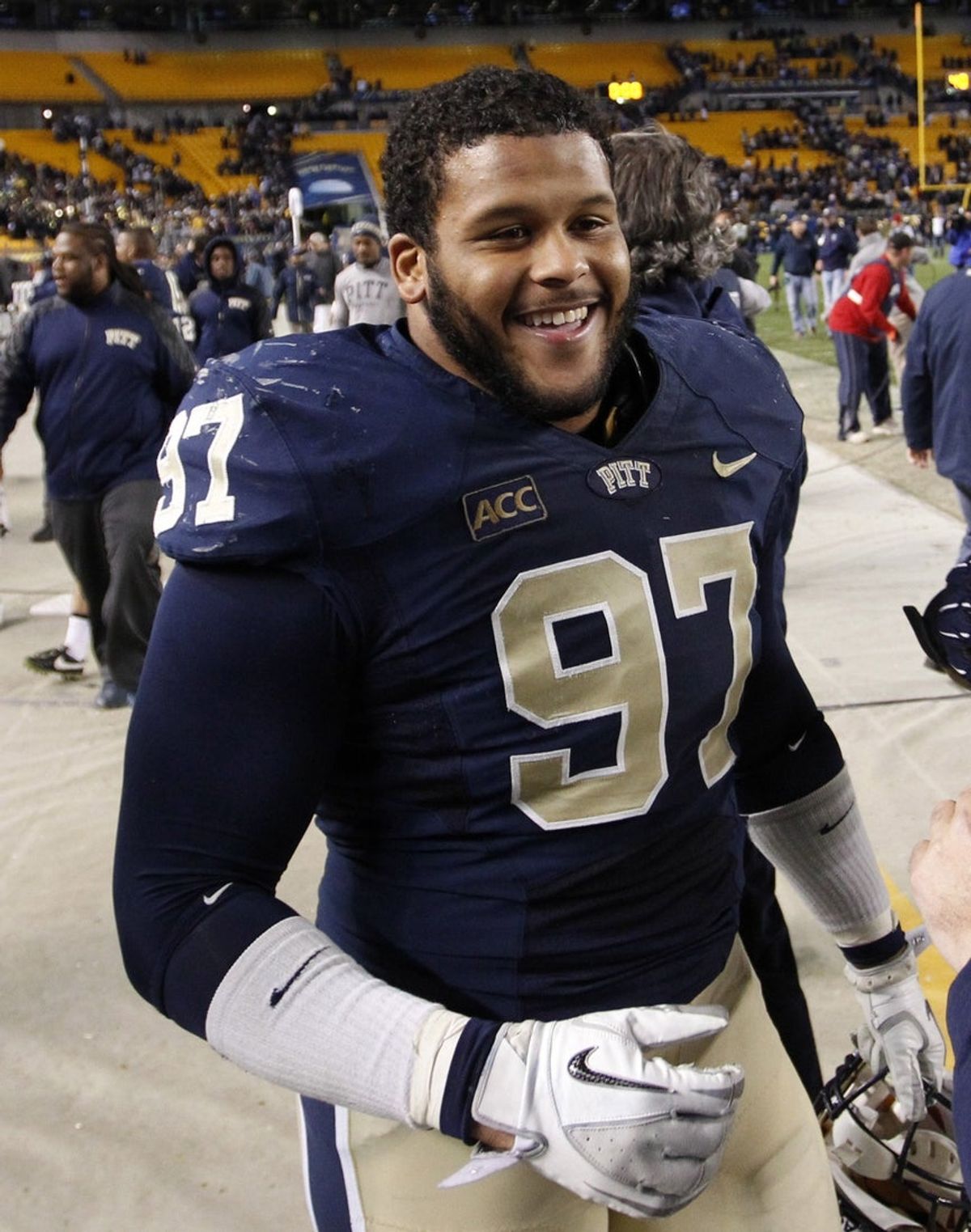 Nov 9, 2013; Pittsburgh, PA, USA; Pittsburgh Panthers defensive lineman Aaron Donald (97) reacts after defeating the Notre Dame Fighting Irish at Heinz Field. PITT won 28-21. Mandatory Credit: Charles LeClaire-Imagn Images