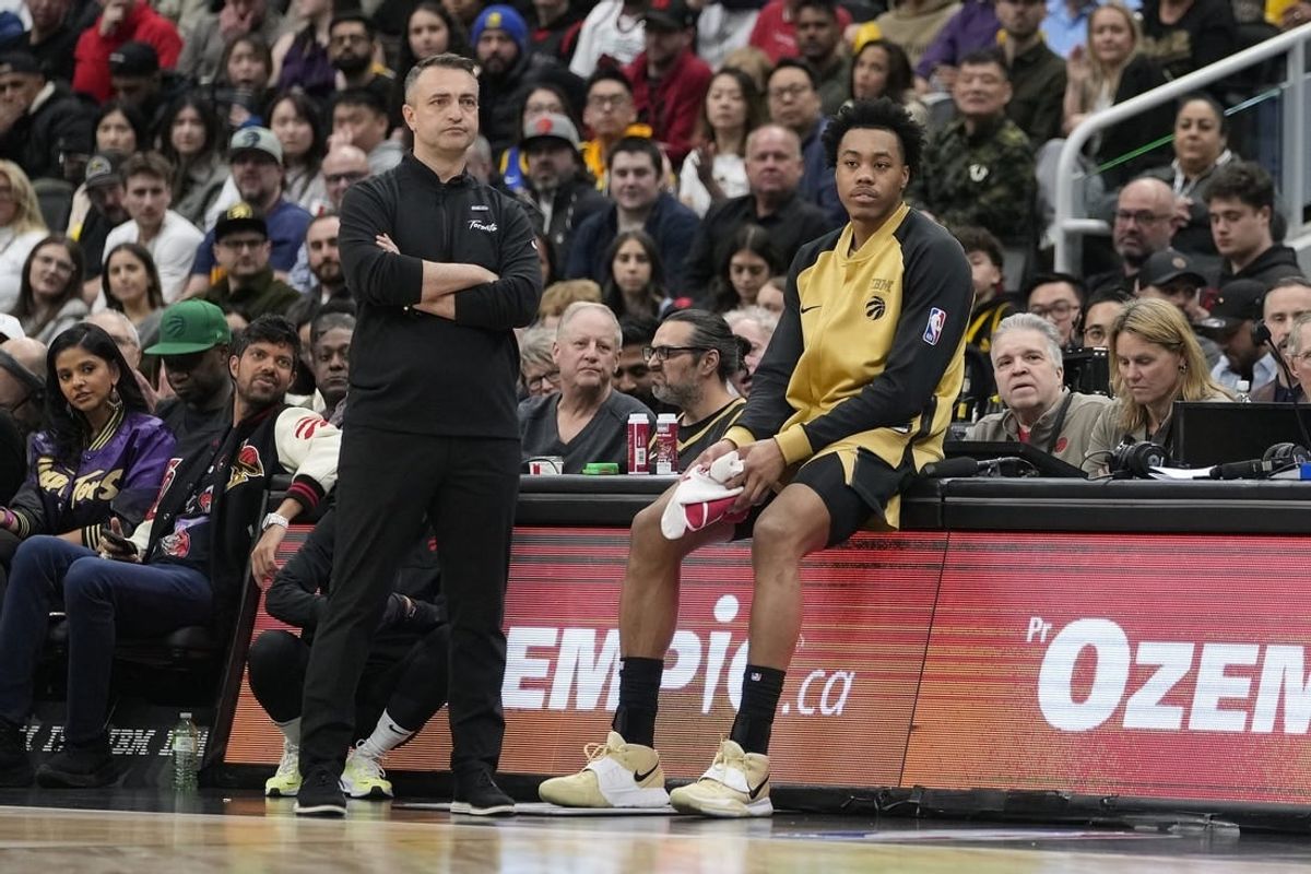 Mar 1, 2024; Toronto, Ontario, CAN; Toronto Raptors head coach Darko Rajakovic and forward Scottie Barnes (4) wait for a stoppage in play against the Golden State Warriors during the first half at Scotiabank Arena.