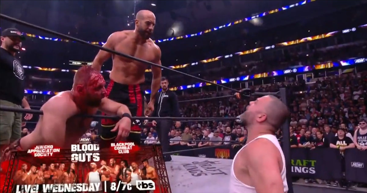 Claudio  Castagnoli (center)   and  Eddie  Kingston  (right) went right back to it.