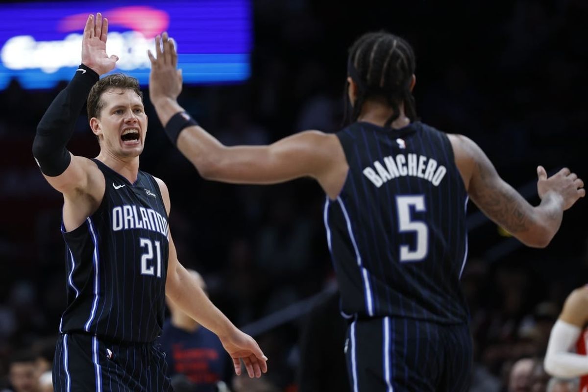 Mar 6, 2024; Washington, District of Columbia, USA; Orlando Magic center Moritz Wagner (21) celebrates with Orlando Magic forward Paolo Banchero (5) /against the Washington Wizards in the second half at Capital One Arena.
