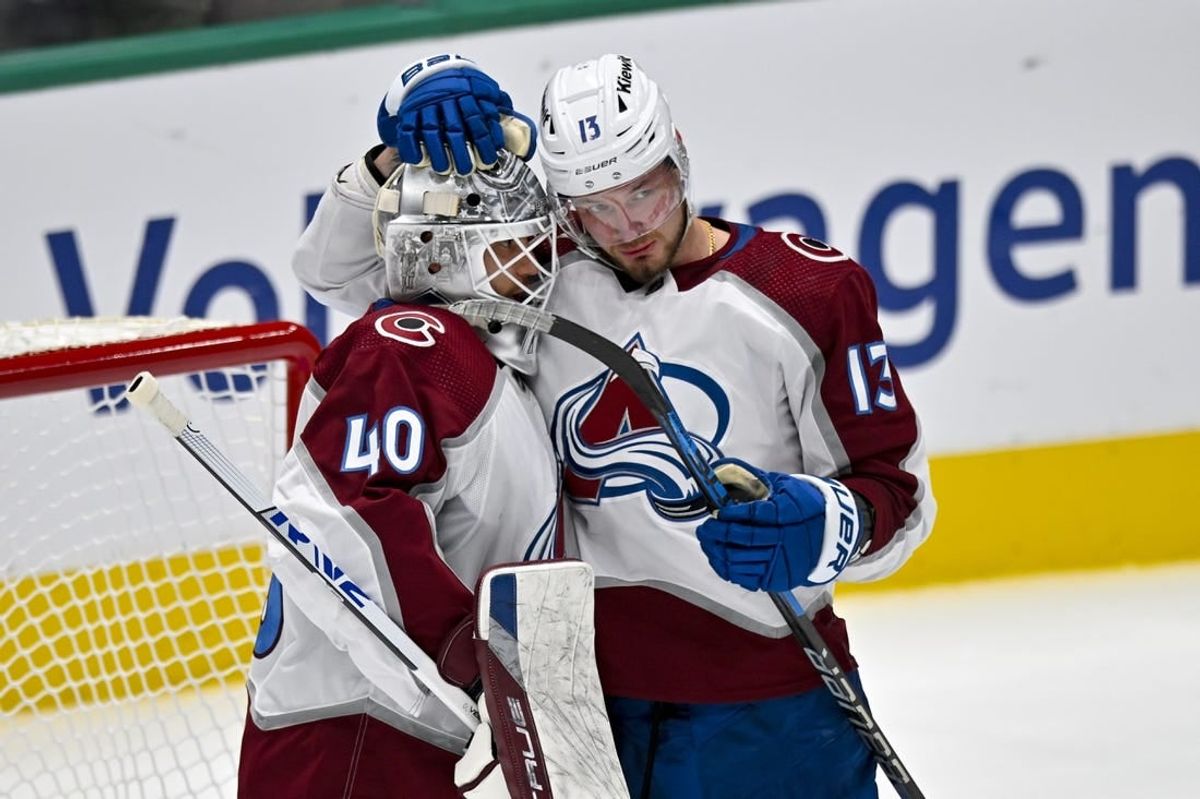Nov 18, 2023; Dallas, Texas, USA; Colorado Avalanche right wing Valeri Nichushkin (13) and goaltender Alexandar Georgiev (40) celebrate after the Avalanche victory over the Dallas Stars at the American Airlines Center.